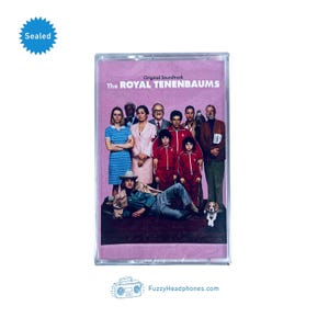 May include: A pink cassette tape with a clear plastic case. The front of the tape features a group of people and the text "The Royal Tenenbaums Original Soundtrack".