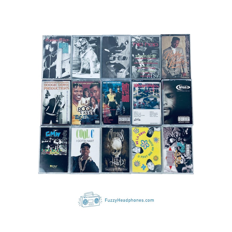 May include: A collection of fifteen vintage cassette tapes, featuring album art with various designs and colors. The tapes showcase a variety of musical artists and genres, with some featuring explicit content warnings. The image includes the website FuzzyHeadphones.com.
