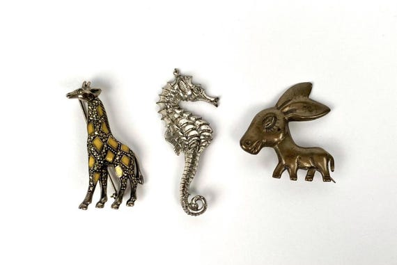 Three Animal-Themed Sterling Silver Brooches Featuring Giraffe, Seahorse, & Donkey Designs Vintage