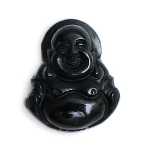 May include: A glossy, black Buddha figurine with a smiling expression. The figure is in a seated position with a rounded belly and a serene face. The figurine is set against a white background.