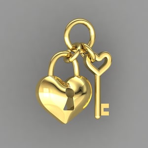 May include: A gold-colored heart-shaped padlock with a keyhole and a matching key. The key is also heart-shaped. The padlock and key are connected by a small loop, creating a charm or pendant.