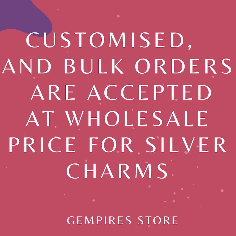 May include: A pink background with white text that reads: "CUSTOMISED, AND BULK ORDERS ARE ACCEPTED AT WHOLESALE PRICE FOR SILVER CHARMS." The text is in a sans-serif font. The words "GEMPIRES STORE" are at the bottom.