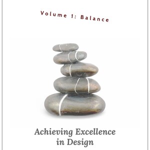 May include: A stack of smooth, gray stones balanced on top of each other, with white lines. The text "Volume 1: Balance" is at the top, and "Achieving Excellence in Design" is at the bottom.