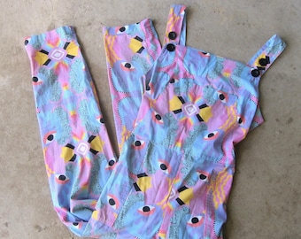 Färgglad retro-jumpsuit i tyg från 80-talet | Ärmlös vintage-byxdräkt | Haklappsoveraller med ögontryck och fickor från 80-talet