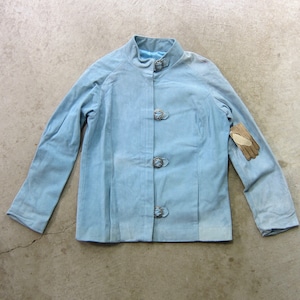May include: A light blue jacket with a mandarin collar and four silver buttons. The jacket has long sleeves and a slightly fitted silhouette.