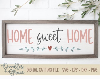 May include: A wooden sign with the text "HOME sweet HOME" in pink and black lettering. A small heart and a leafy vine are below the text.
