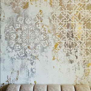 May include: Abstract wall art featuring a textured design with white, gold, and gray tones. The artwork showcases intricate patterns, including floral and geometric motifs, creating a visually rich and artistic statement piece.