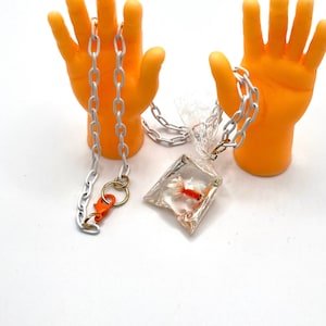 Goldfish in a Bag Necklace...I WANT IT!