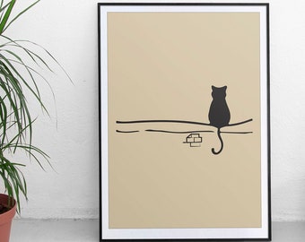 Peut inclure: Une illustration en noir et blanc d'un chat assis sur une branche avec une petite pile de blocs en dessous. L'illustration est imprimée sur un fond beige et encadrée en noir.