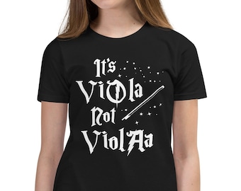 May include: Black youth t-shirt with white text that reads "It's Viola not ViolA" with a white wand and stars.
