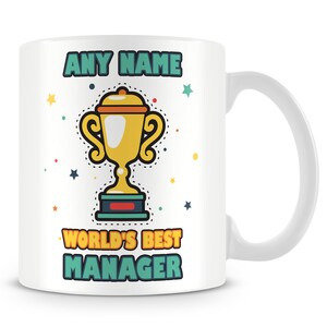 May include: White ceramic mug featuring a gold trophy illustration and the text "ANY NAME WORLD'S BEST MANAGER" in colourful text.
