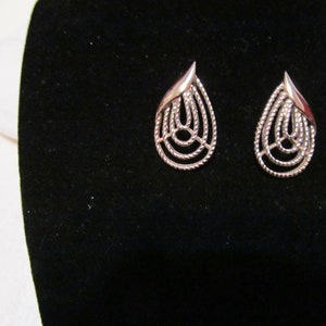 Vintage Trifari silver tone pierced earrings signed