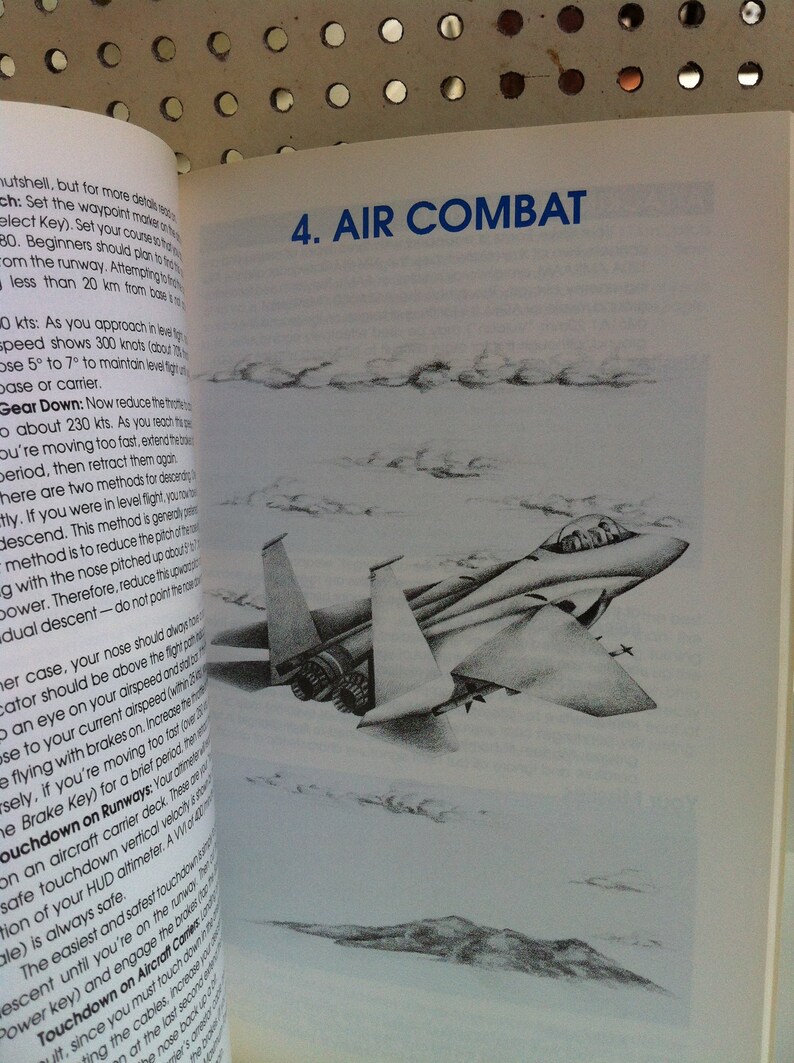 May include: A black and white illustration of a fighter jet flying in the sky. The text "4. AIR COMBAT" is printed in blue at the top of the page.