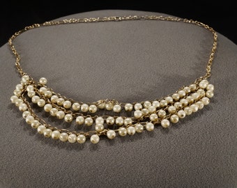 vintage gold tone and faux pearl bib style necklace with a three strand bib, pearls set in groups of three, 30 inches  **M3