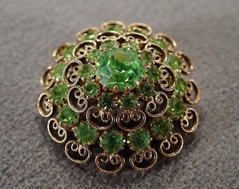 Vintage Yellow Gold Tone Pin Brooch Multi Round Prong Set Green Faceted Glass Rhinestone Halo Setting Fancy Scrolled Etched Setting    #2829