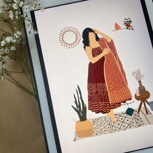 May include: Digital illustration of a woman in a maroon dress and shawl, standing on a patterned rug. The artwork includes a sun-shaped design, potted plants, and decorative items, all rendered in warm, earthy tones. A tablet displays the artwork.