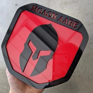 Molon Labe Badge - Fits 2019-2024 Dodge® Ram® Tailgate -1500, 2500, 3500 - Gloss Black on Red