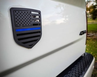 American Flag Badge - Fits 2009-2018 Dodge® Ram® Tailgate -1500, 2500, 3500 - Matte black on Gloss Black w Thin Blue Line