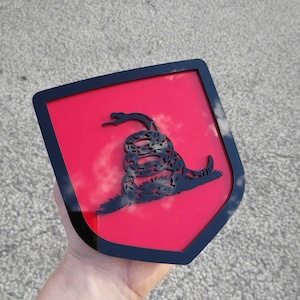 Don&#39;t Tread on Me Snake Badge - Fits 2009-2018 Dodge® Ram® - 1500, 2500, 3500 - Gloss Black on Red