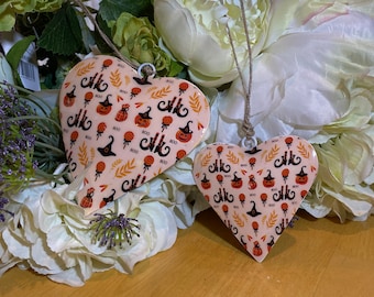Halloween Heart Decoration: Orange & Black Pumpkin Design