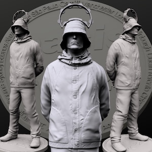 May include: A grey sculpture of a person in a hooded jacket, trousers, and a hat with a circular halo. The figure stands on a circular base. The background shows a large coin with city names.