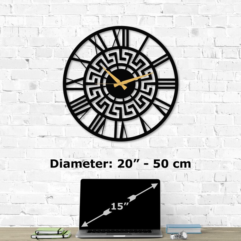 Size guide infographic for Metal Wall Clock with a Flower of Life design on a white brick wall. Image text shows 'Diameter:  20 inch - 50 cm' compared to a 15-inch laptop on a desk. Sacred Geometry Decor by Degary.