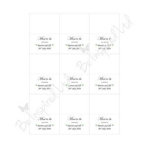 May include: A sheet of rectangular labels featuring the text Mint to be, followed by five dots, the names Martin and Jill, and the date 26th July 2026, flanked by two small light green hearts. The design includes faint butterfly graphics.