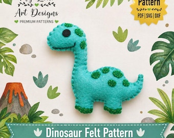 May include: A turquoise felt dinosaur with green spots and trim, set against a watercolour background with foliage and a volcano. The image includes text that reads "Dinosaur Felt Pattern" and "My Little Art Designs".