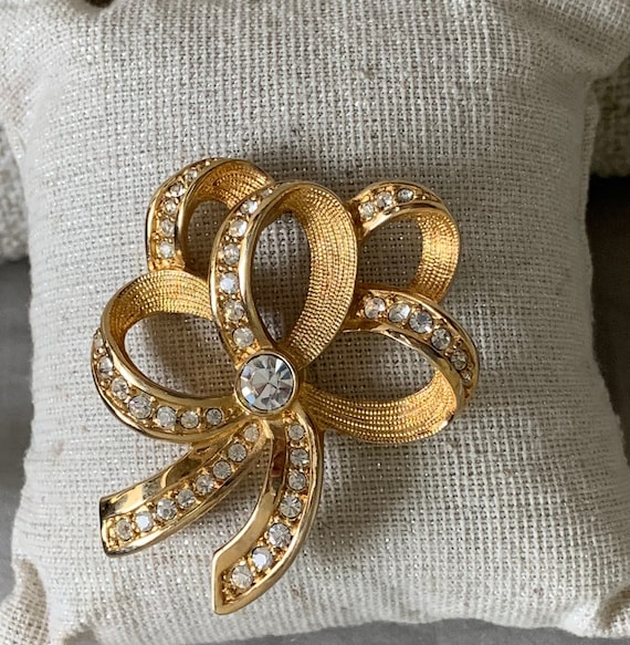 cc pearl brooch