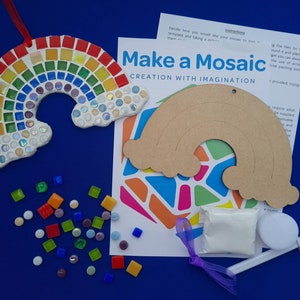May include: A rainbow mosaic craft kit with a wooden rainbow template, colorful mosaic tiles, glue, and a spreader. The kit includes instructions for creating a mosaic rainbow.