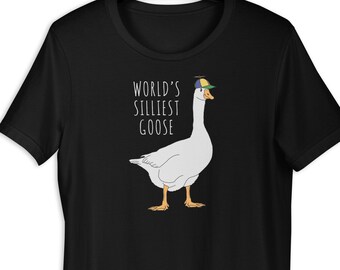 May include: Black t-shirt with a white goose wearing a blue and yellow baseball cap. The text "WORLD'S SILLIEST GOOSE" is printed on the shirt.