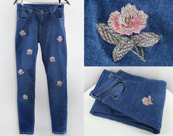 Vintage blue jeans with floral embroidery