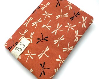 Personalized passport cover printed with terracotta dragonflies