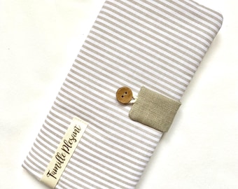 Personalized family record book cover with button closure. Beige striped
