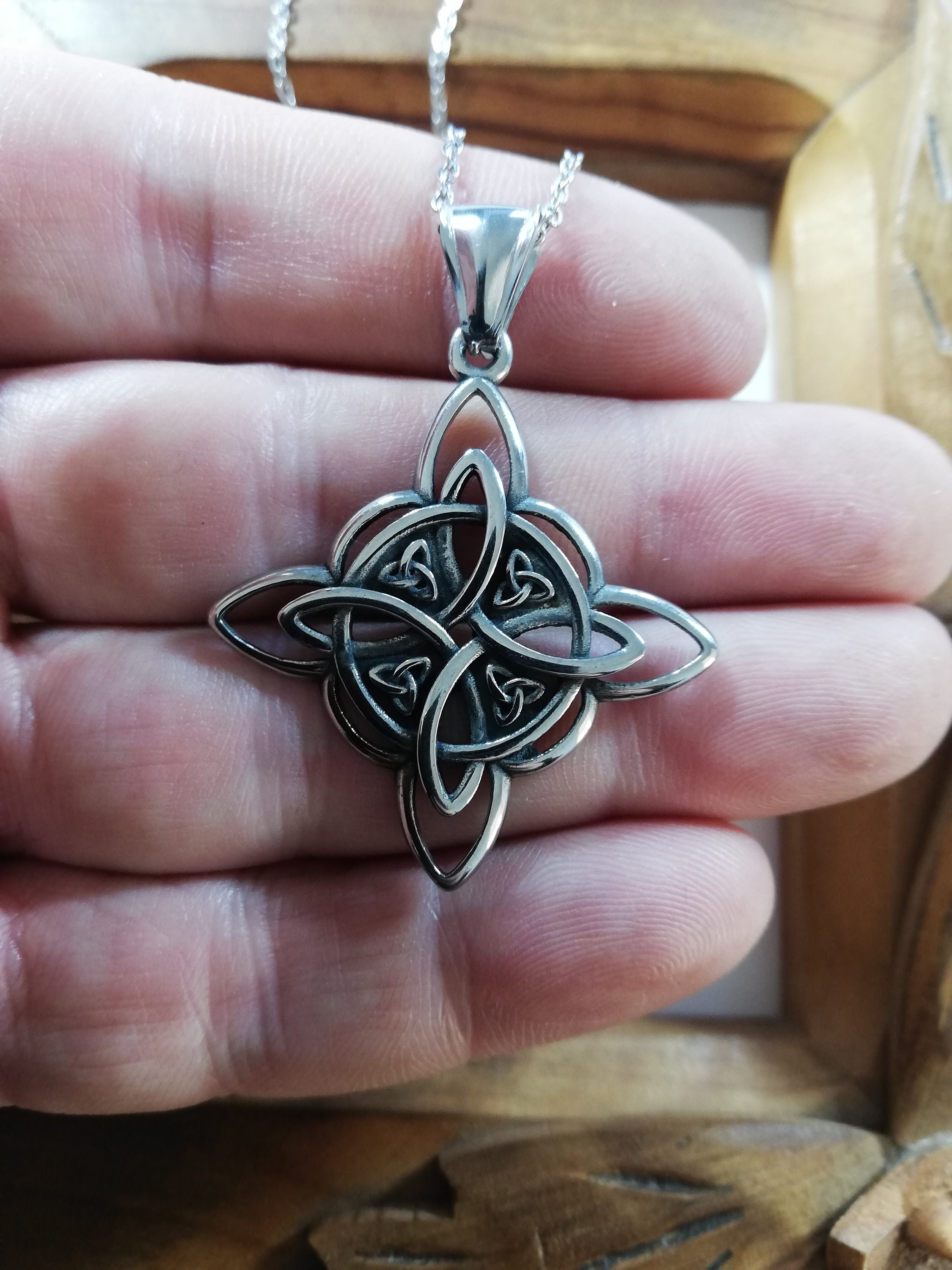 Stainless steel Witch's Knot pendant (35x35mm). 45cm adjustable stainless steel chain.