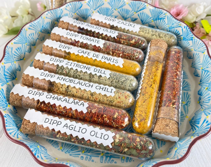 Spice dip Zaziki, Cafe de Paris, tomato, garlic chili, bruschetta arrabbiata, lemon dill, chakalaka, aglio olio in a test tube 10g each