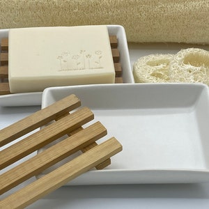 Ceramic soap dish with bamboo draining grid