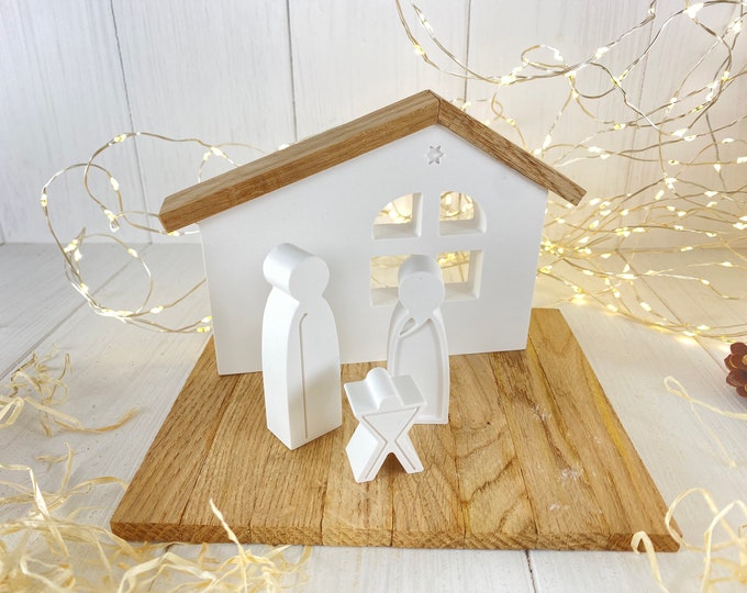 Modern nativity scene made of Raysin and wood Christmas time Winter time Candle holder Star