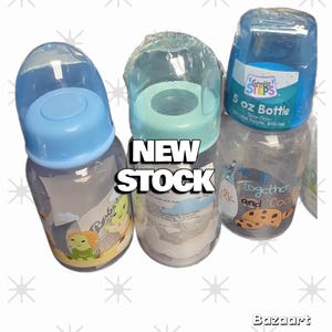 Realistic faux baby bottles and pacifiers for dolls
