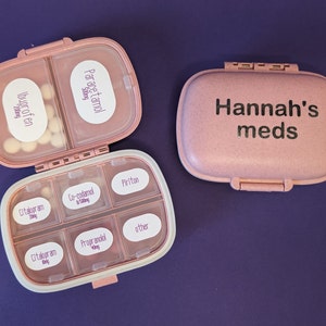 Pill organiser box with custom labels