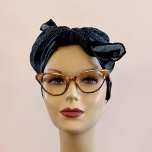 Montura de gafas de ojo de gato de aluminio Tura vintage de los años 50