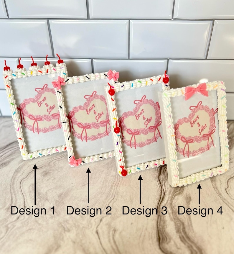 May include: Four white picture frames with a frosting-like design and colorful sprinkles. Each frame has a pink heart with the text "Bows & Silos" inside. The frames are labeled "Design 1", "Design 2", "Design 3", and "Design 4".