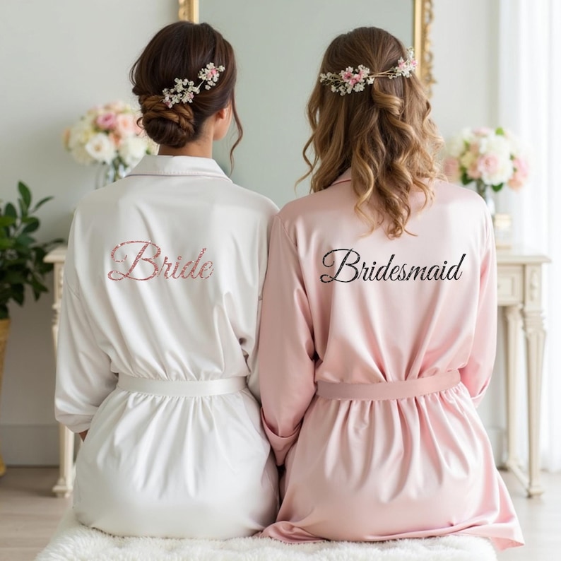 White and blush pink robes with custom text for women, bridesmaid, bride, friends and more. Great to wear on girls trips, spa days, bachelorette etc.