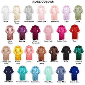 Satin robes in 26 colors including white, navy blue, turquoise blue, ocean blue, mint blue, dusty blue, rose pink, black, champagne gold, emerald green, rose gold and wine/burgundy. Robes can be personalized in the front and back.