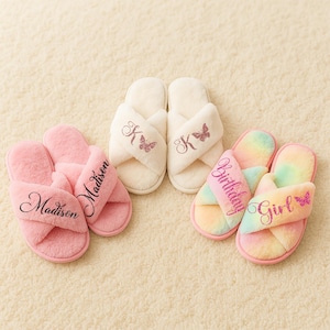 A showcase of different fluffy slippers personalized with text and symbols. The examples show are pink slippers with the name Madison, ivory slippers customized with the letter K and a butterfly and birthday girl slippers.