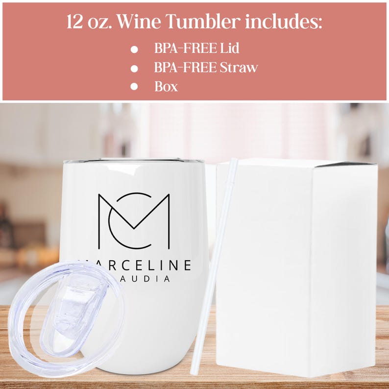May include: A white 12 ounce wine tumbler with a black logo that says "Marceline Audia" and a black outline of the letters "M" and "C". The tumbler comes with a white lid, a white straw, and a white box.