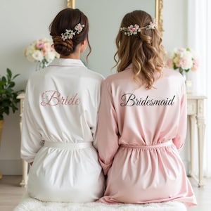 White and blush pink robes with custom text for women, bridesmaid, bride, friends and more. Great to wear on girls trips, spa days, bachelorette etc.