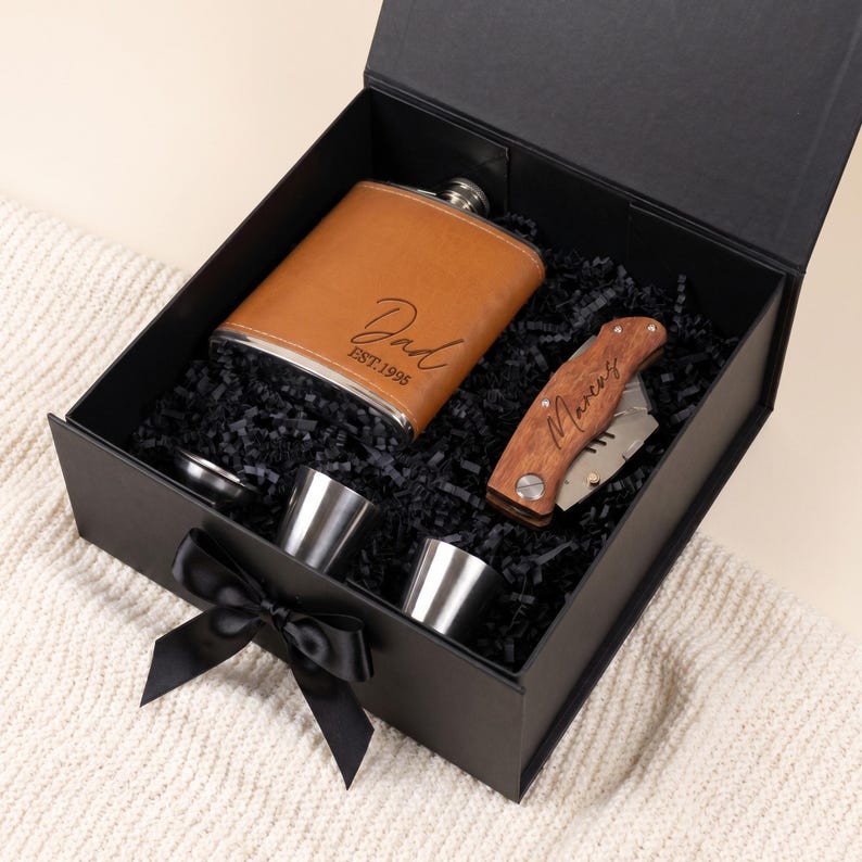 Sleek gift box for dad with personalized pocket knife and personalized flask. A great personalized dad gift for fathers day or birthday.