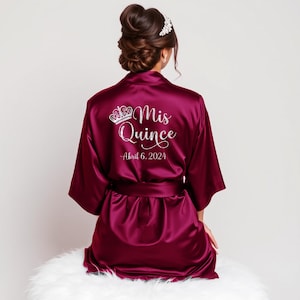 Pretty wine burgundy quinceanera robes personalized with name and date. Great quinceanera gifts for the birthday girl.