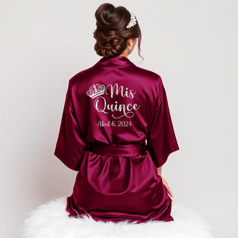 Pretty wine burgundy quinceanera robes personalized with name and date. Great quinceanera gifts for the birthday girl.